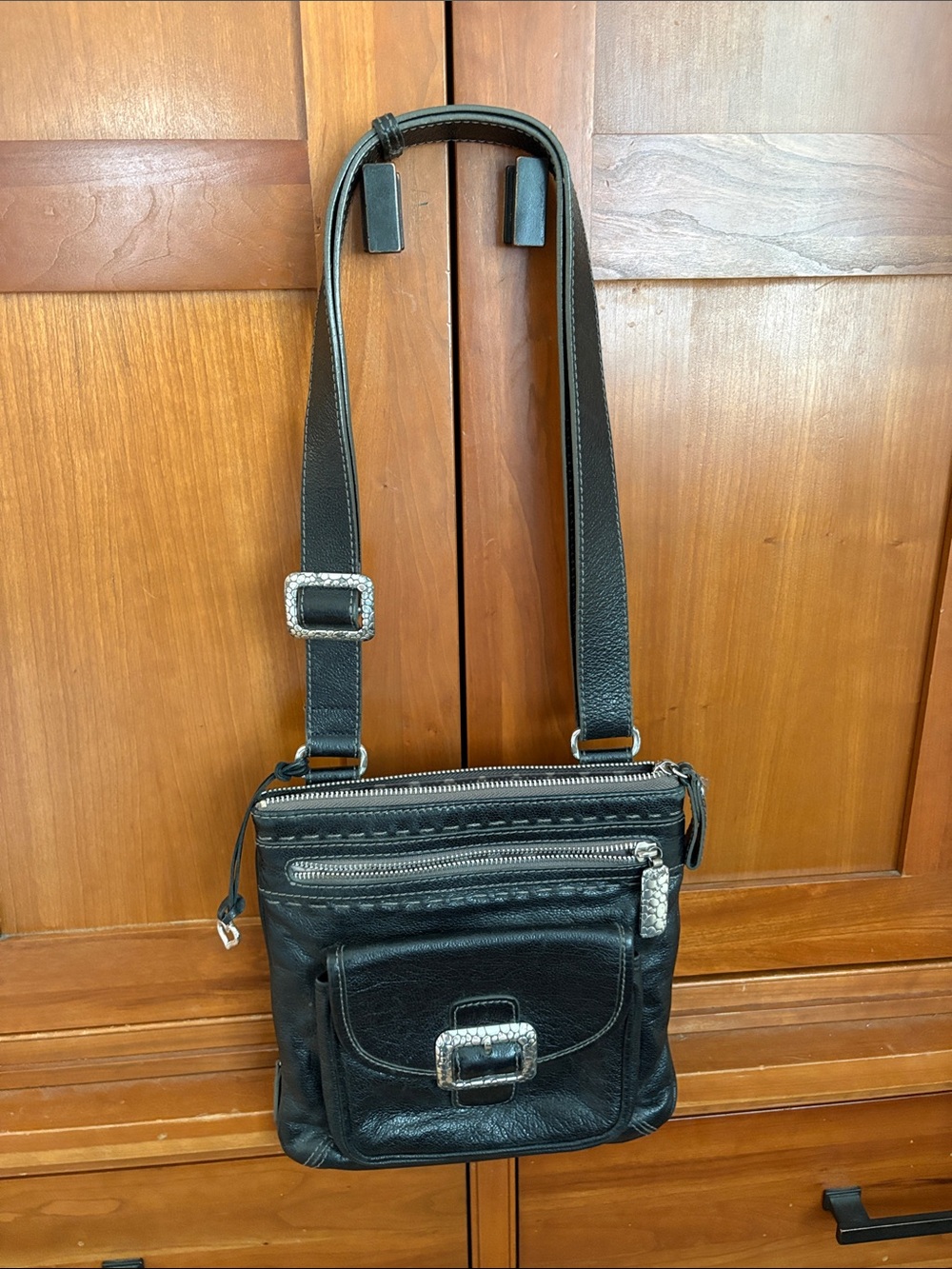 Brighton Black Leather Messenger Bag with Silver Buckle Accents